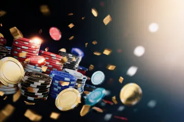 A professional dealer in a tuxedo greeting players at the roulette table, symbolizing the authentic live casino feel at 26JL.